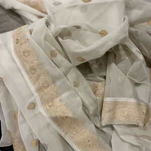 Elegant Cream and Gold Embroidered Fabric
